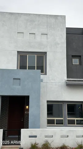 a view of an ocean with furniture