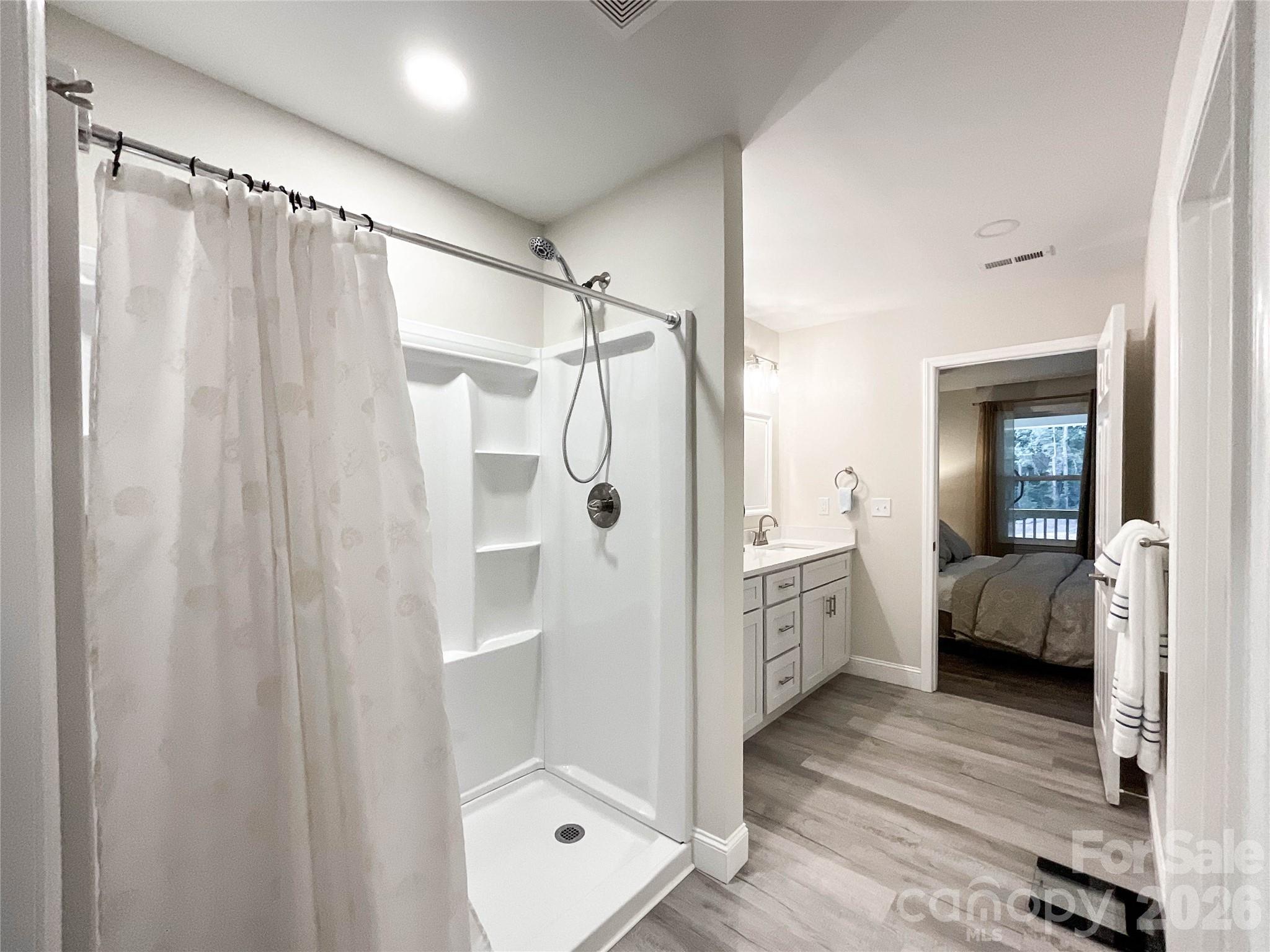 404 White Store Road Wadesboro, NC 28170 - Photo 25 of 38 a bathroom with a shower and a tub