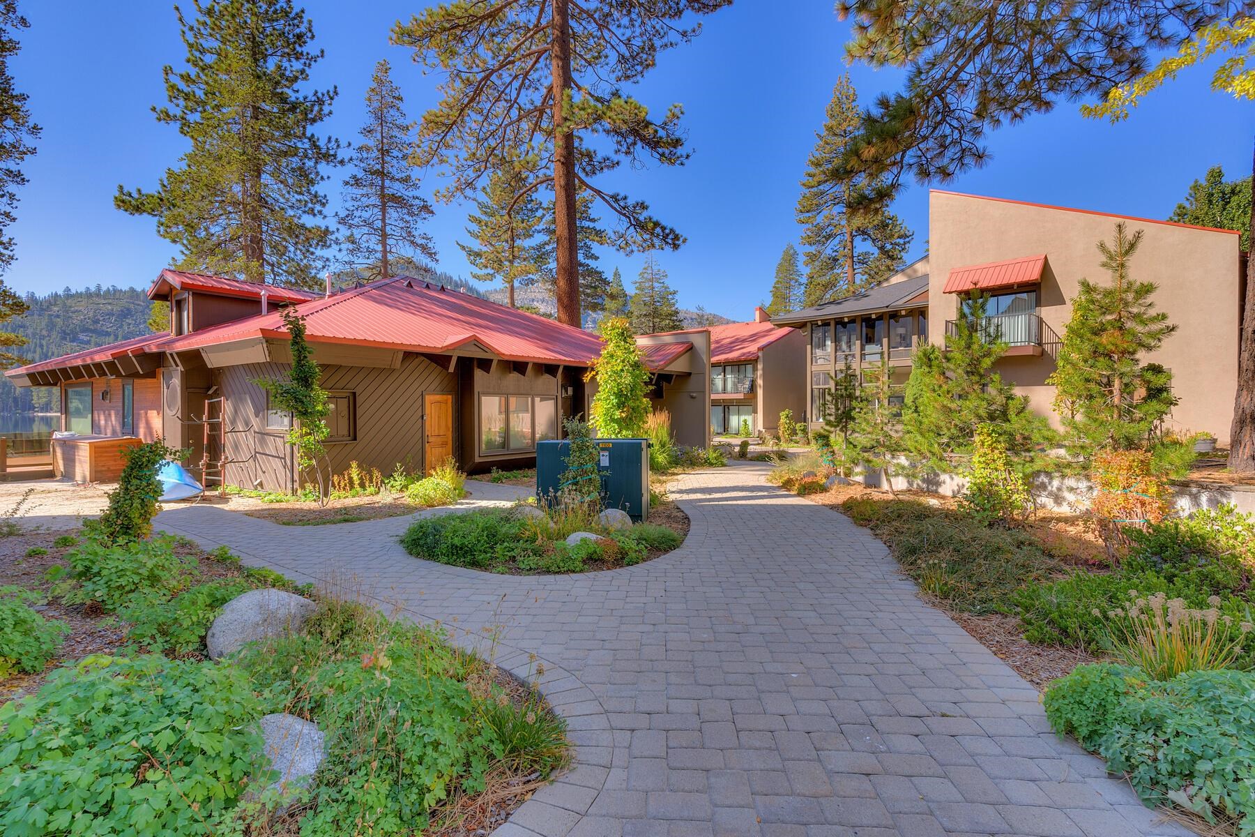 15775 Donner Pass Road, Unit 114 Truckee, CA 96161 - Photo 11 of 17 a front view of a house with a yard and outdoor seating