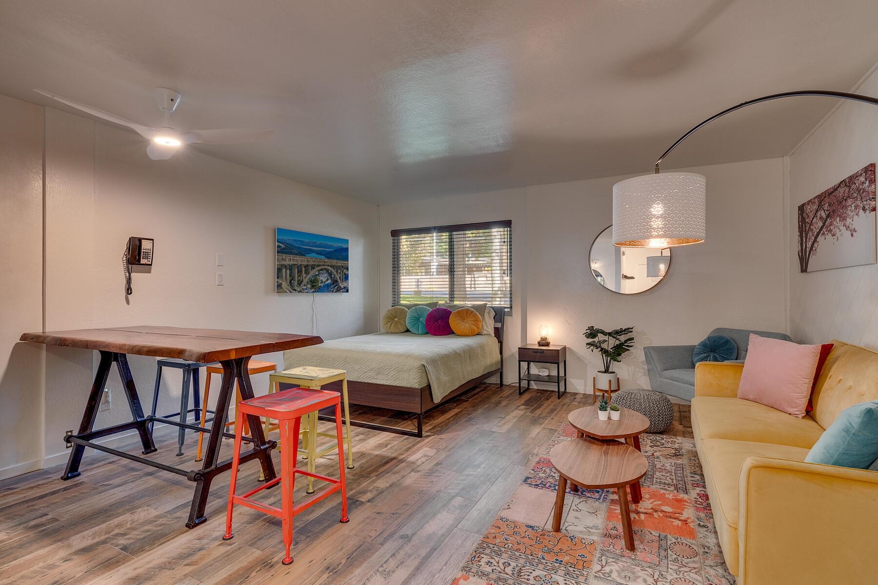 15775 Donner Pass Road, Unit 114 Truckee, CA 96161 - Photo 2 of 17 a living room with furniture and wooden floor