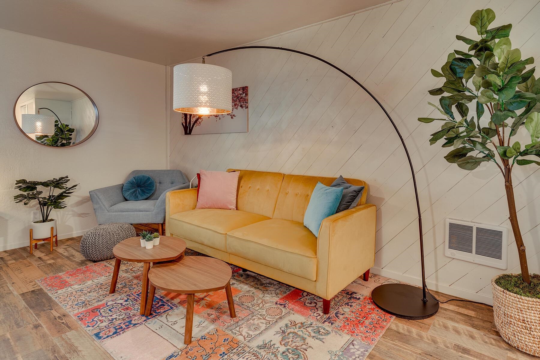 15775 Donner Pass Road, Unit 114 Truckee, CA 96161 - Photo 3 of 17 a living room with furniture and a mirror