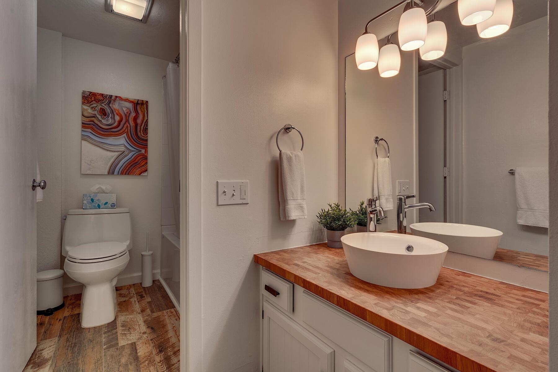 15775 Donner Pass Road, Unit 114 Truckee, CA 96161 - Photo 7 of 17 a bathroom with a granite countertop sink and a mirror