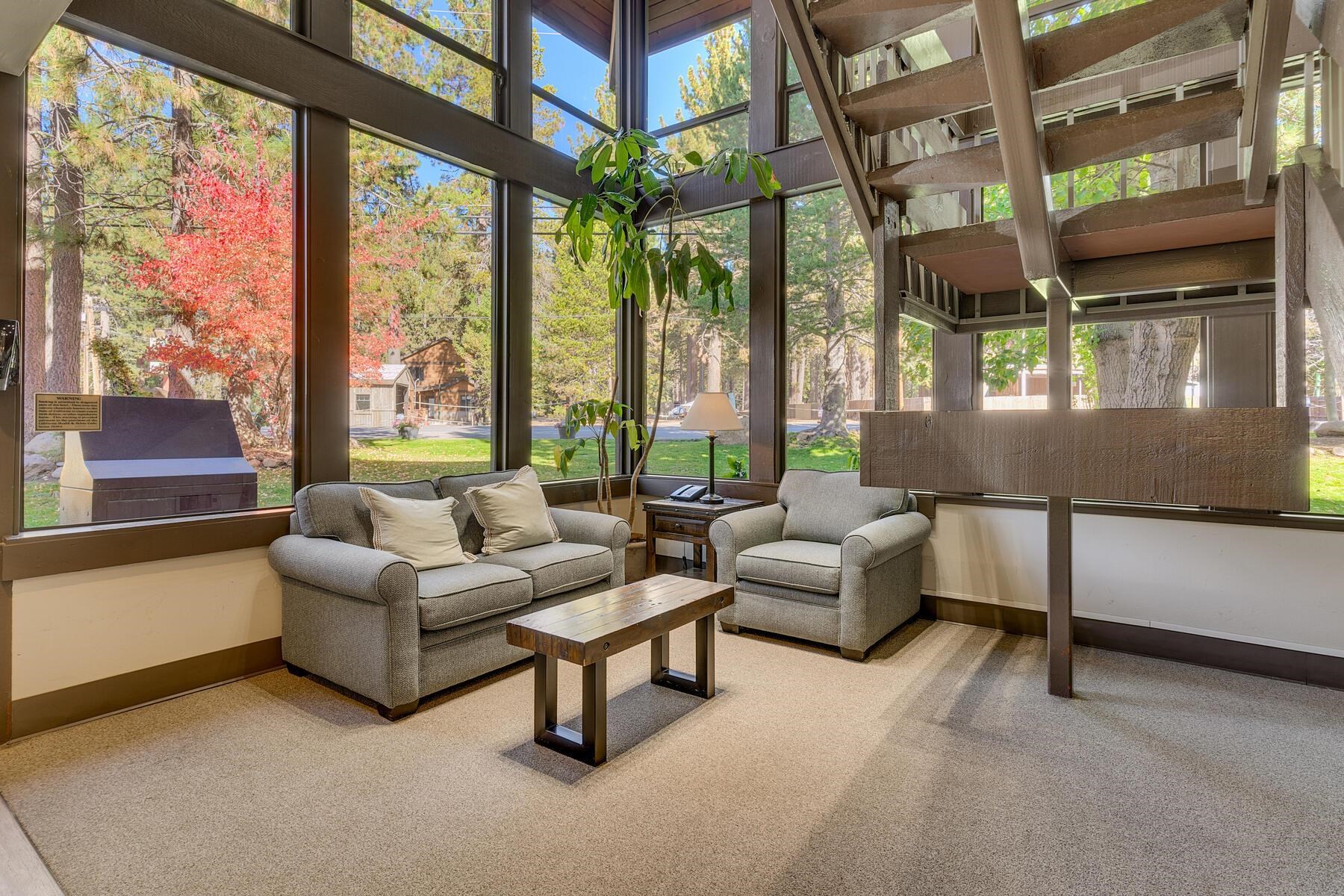 15775 Donner Pass Road, Unit 114 Truckee, CA 96161 - Photo 8 of 17 a living room with furniture and a large window