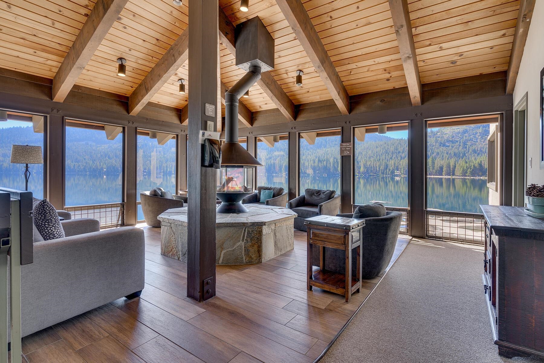 15775 Donner Pass Road, Unit 114 Truckee, CA 96161 - Photo 10 of 17 a view of a dining room with furniture wooden floor and chandelier