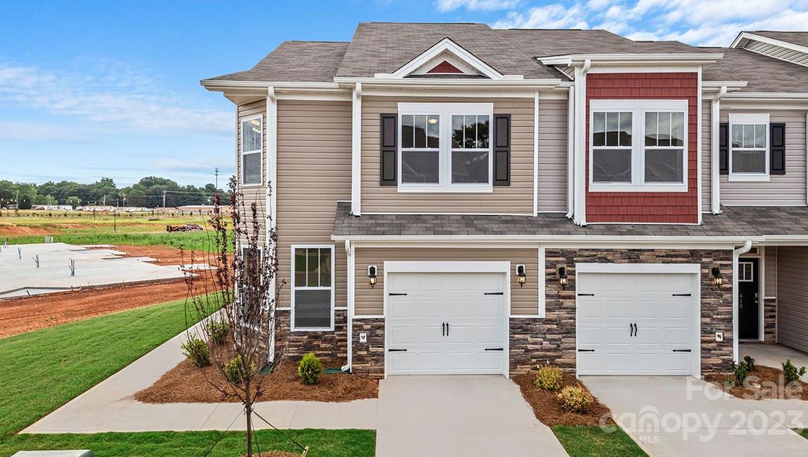 26 Ravens Rdg Road Hendersonville, NC 28792 - Photo 2 of 27 a front view of a house with a yard balcony and ocean view