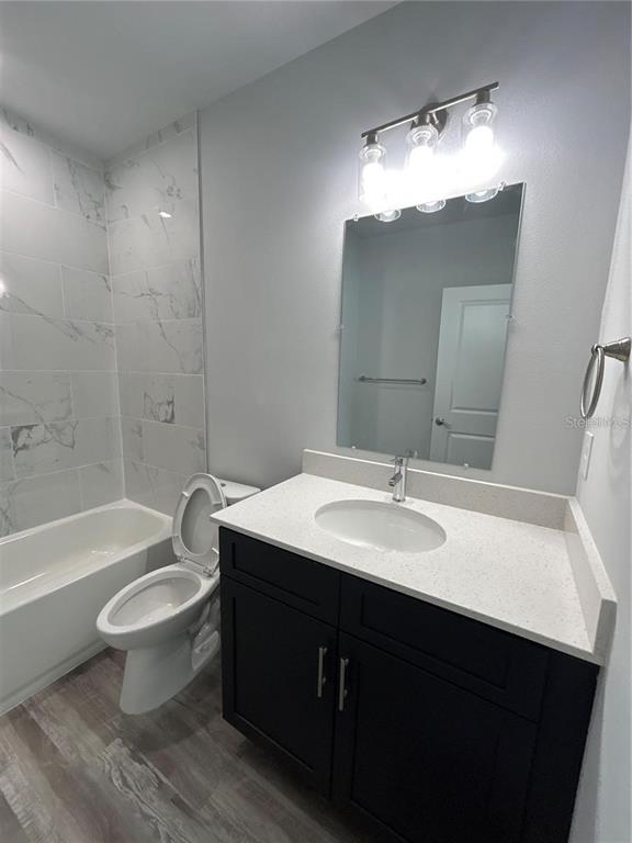 2115 Puffin Street Sebring, FL 33870 - Photo 8 of 9 a bathroom with a sink and a mirror