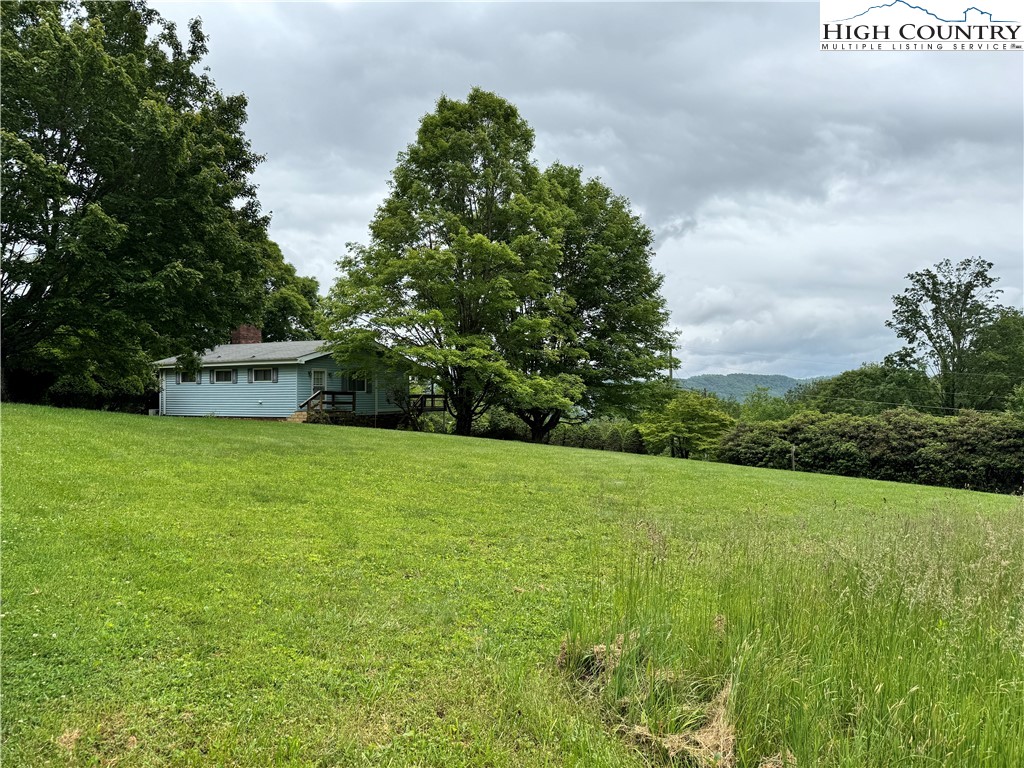 Hub Brown Road Boone, NC 28607 - Photo 5 of 6 a view of a field of grass and trees