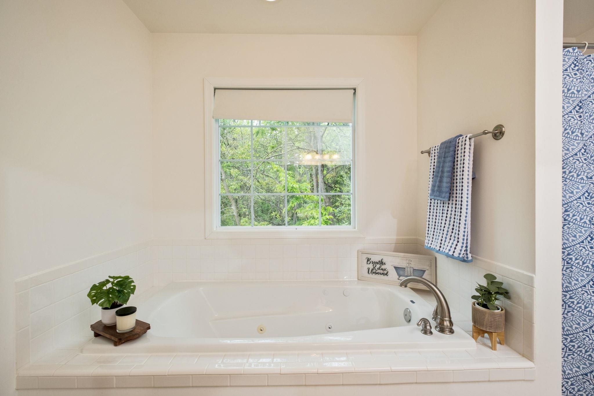 1456 New Hope Road Staunton, VA 24401 - Photo 15 of 46 a bath tub sitting next to a window