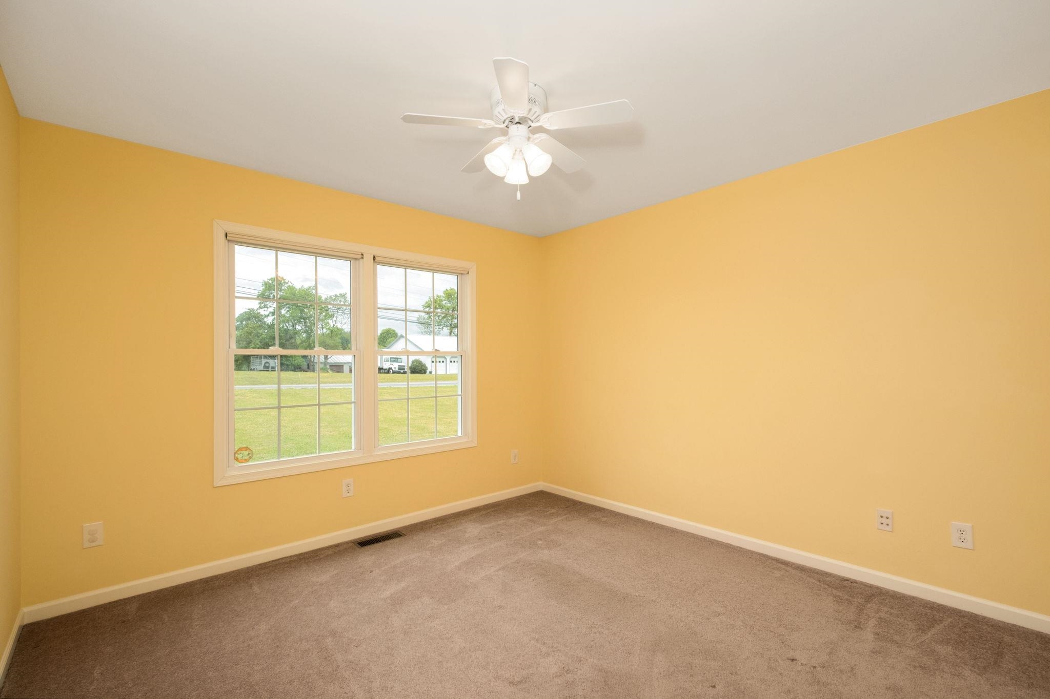 1456 New Hope Road Staunton, VA 24401 - Photo 20 of 46 a view of an empty room with a window