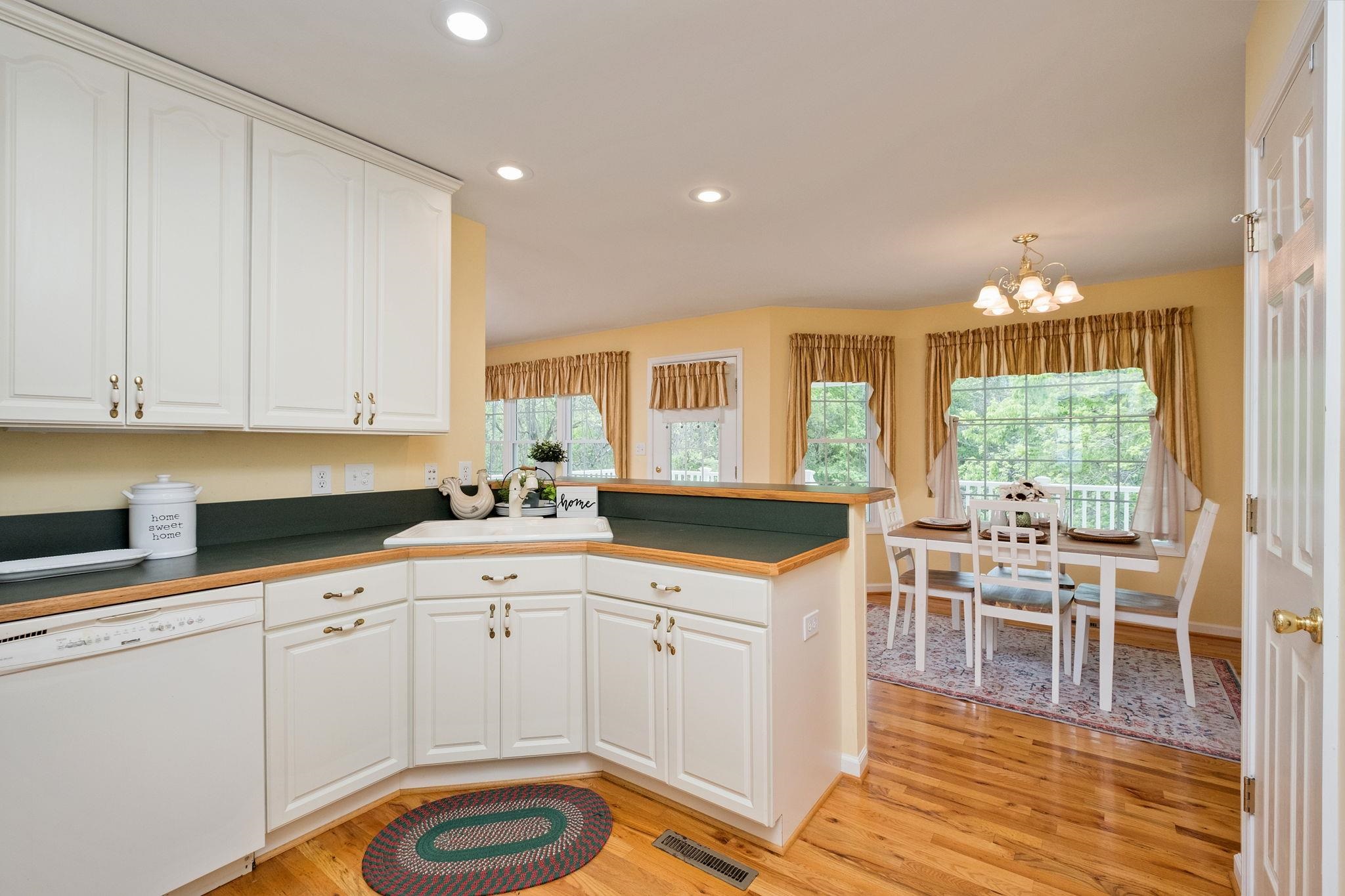 1456 New Hope Road Staunton, VA 24401 - Photo 2 of 46 a kitchen with a sink and cabinets