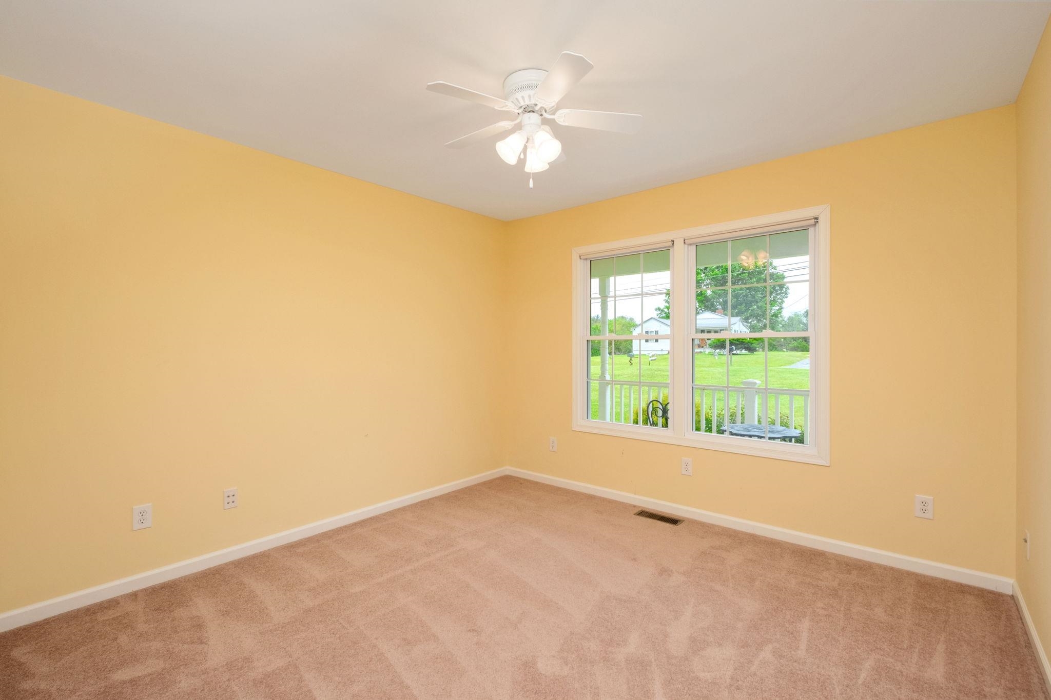 1456 New Hope Road Staunton, VA 24401 - Photo 21 of 46 a view of an empty room with a window