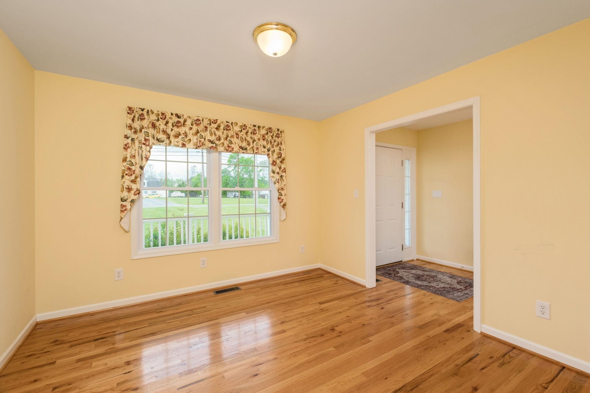 1456 New Hope Road Staunton, VA 24401 - Photo 24 of 46 an empty room with wooden floor and windows