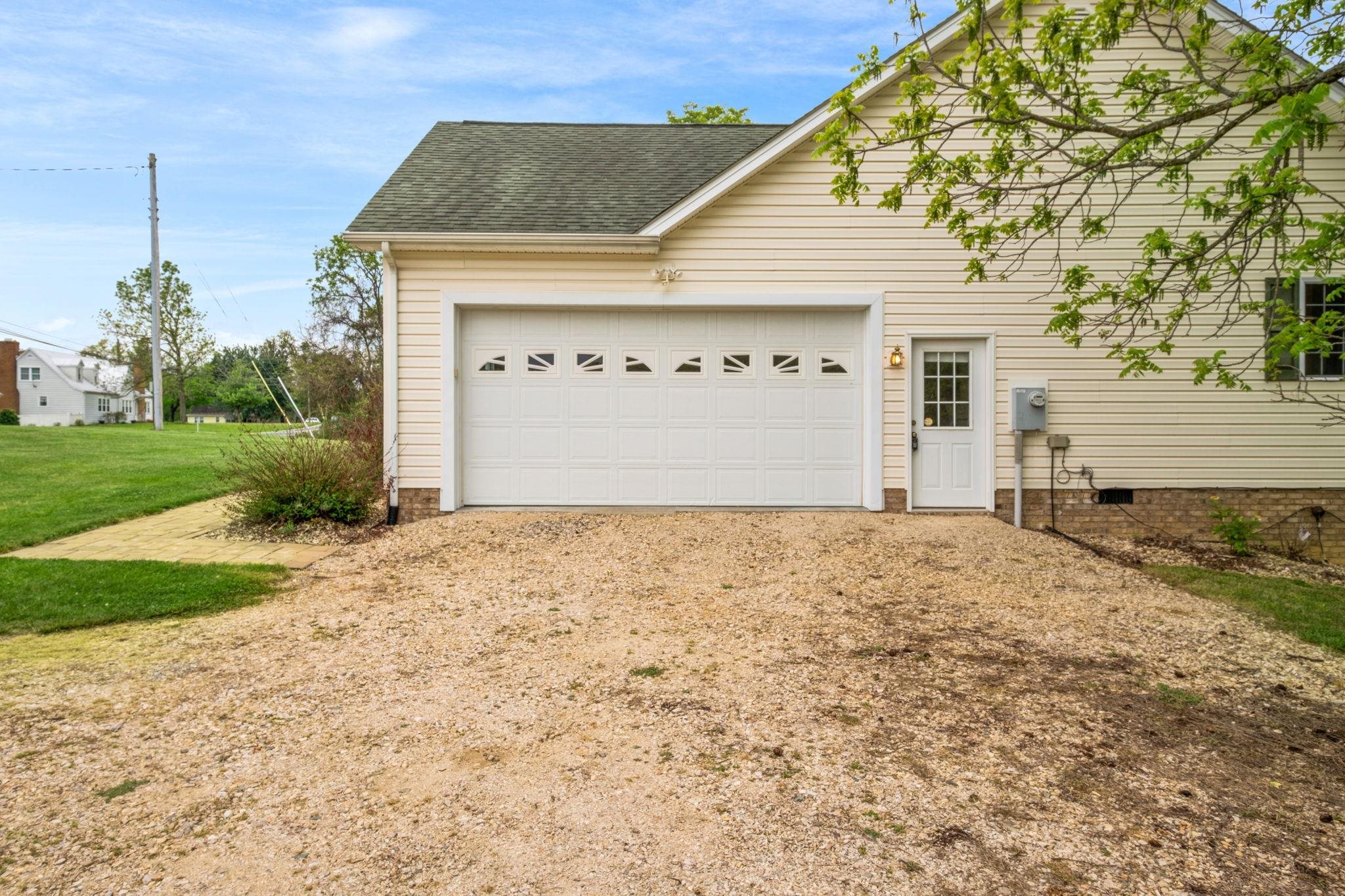 1456 New Hope Road Staunton, VA 24401 - Photo 33 of 46 a view of a house with a yard and garage