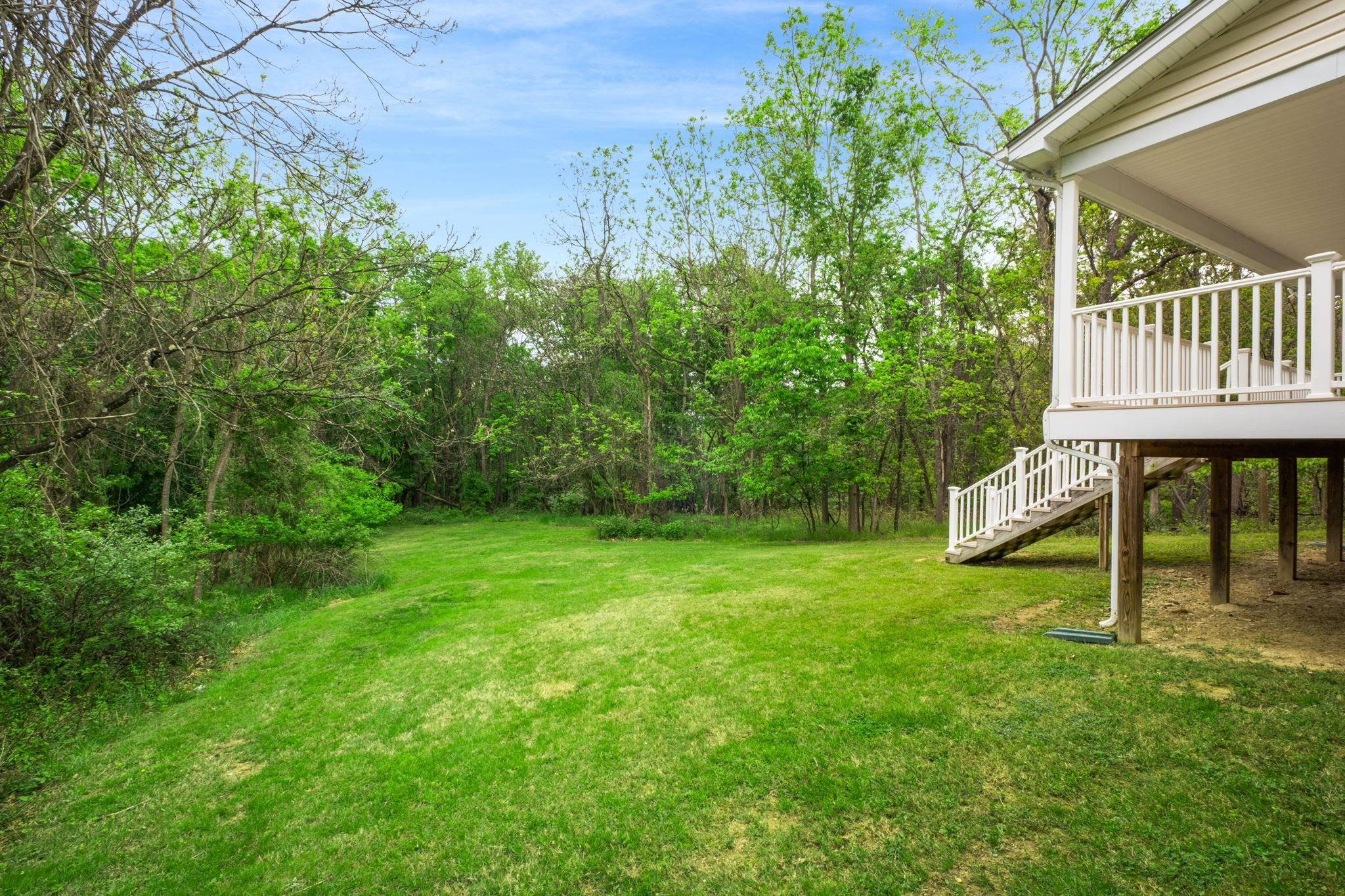 1456 New Hope Road Staunton, VA 24401 - Photo 37 of 46 a view of a house with backyard and a hammock