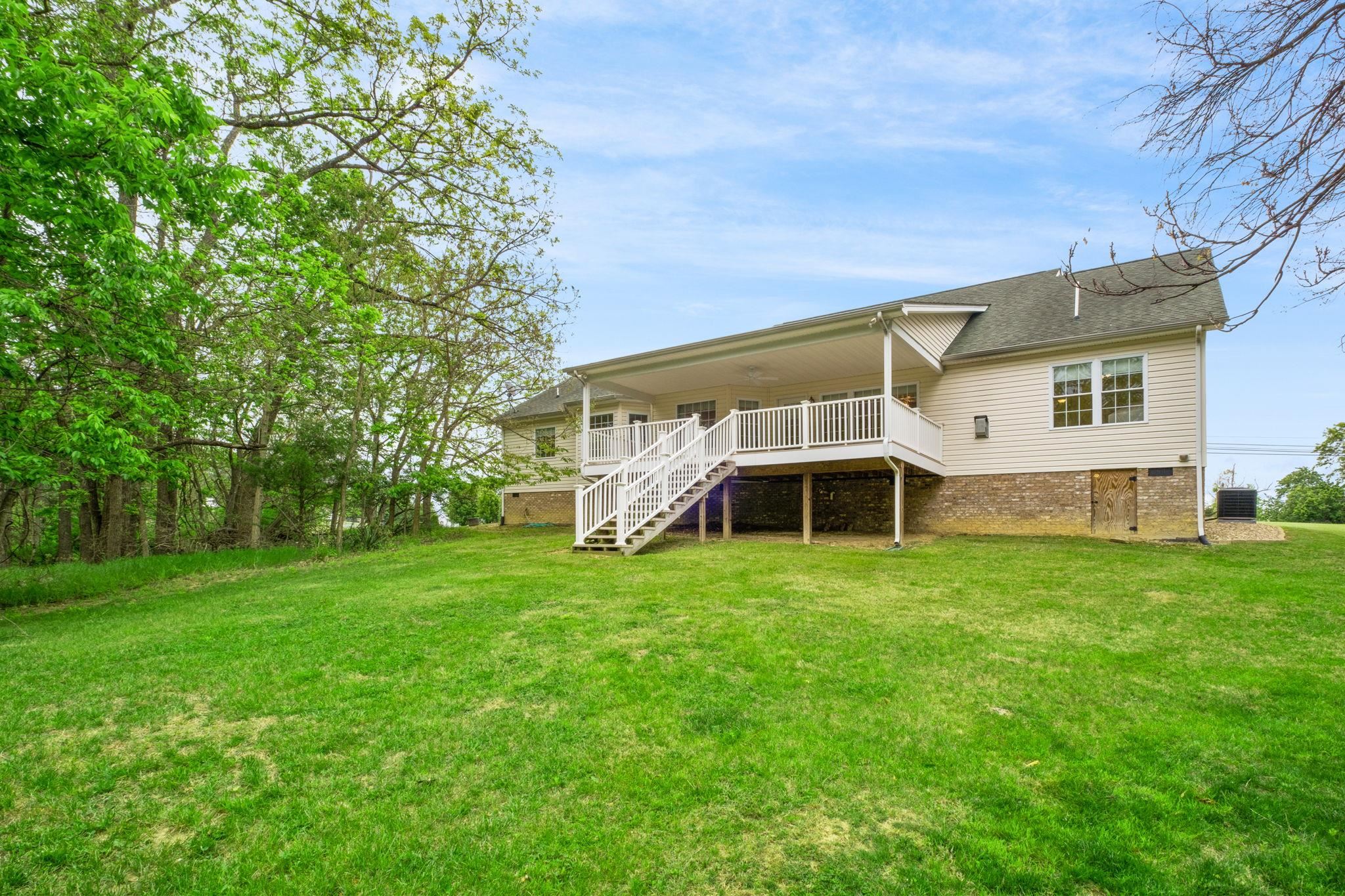 1456 New Hope Road Staunton, VA 24401 - Photo 38 of 46 a view of a house with a big yard and large trees