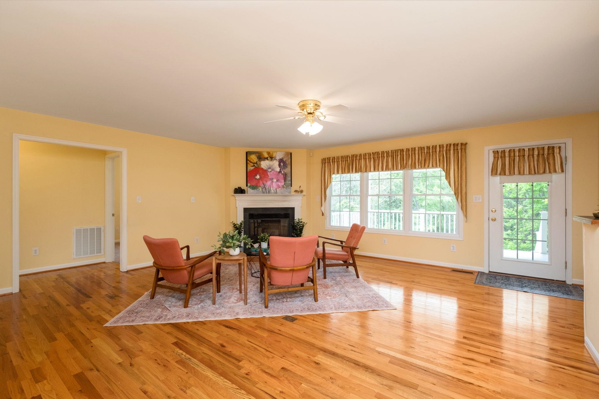1456 New Hope Road Staunton, VA 24401 - Photo 10 of 46 a living room with fireplace furniture and a wooden floor