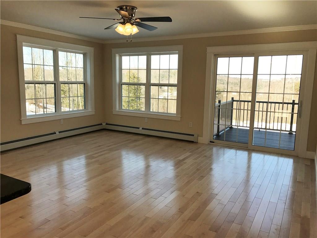 51 Dr Mann Road Augusta, ME 04330 - Photo 6 of 35 The living room is filled with light...