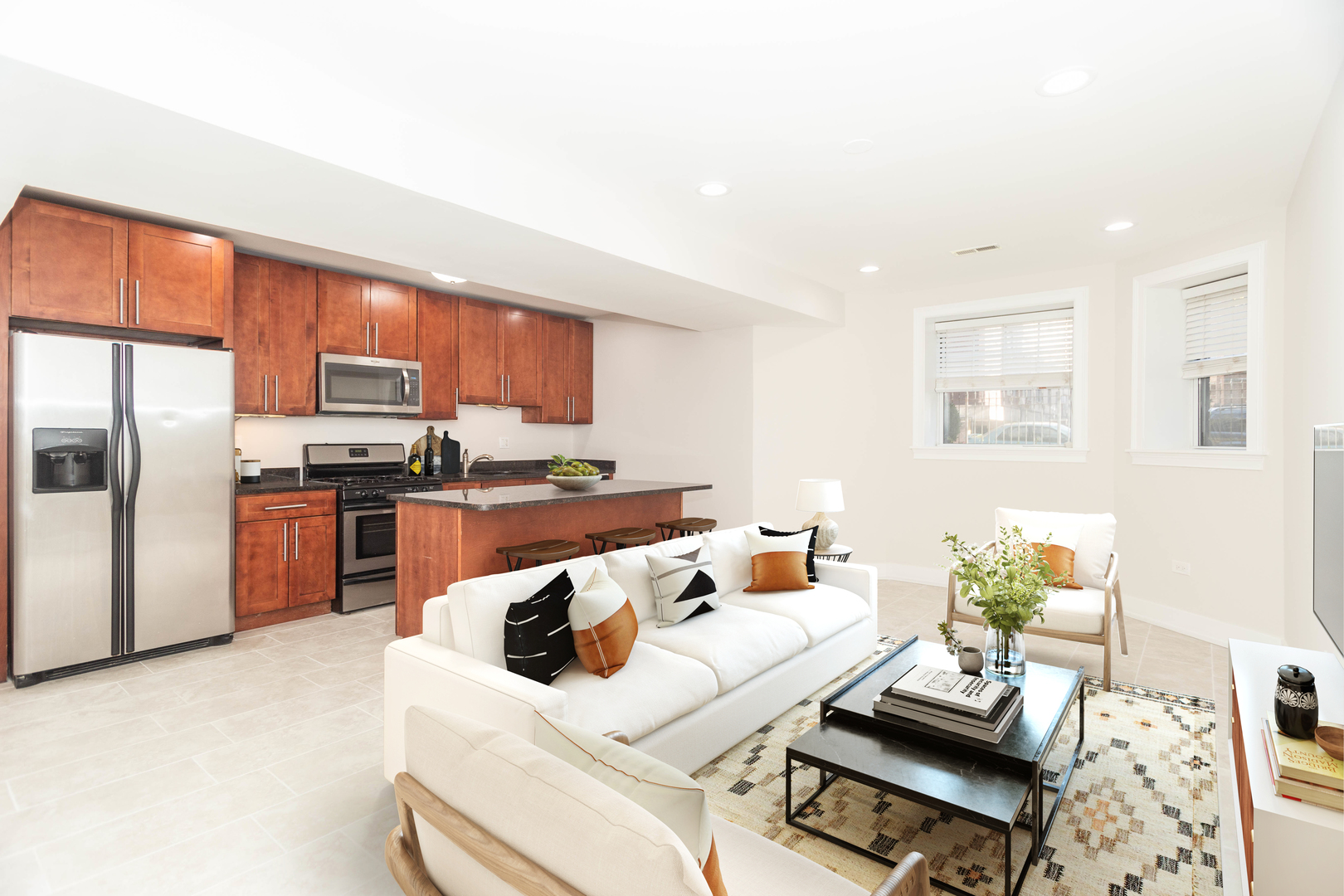 5444 North Winthrop Avenue, Unit GS Chicago, IL 60640 - Photo 2 of 18 a living room with stainless steel appliances furniture and a kitchen view