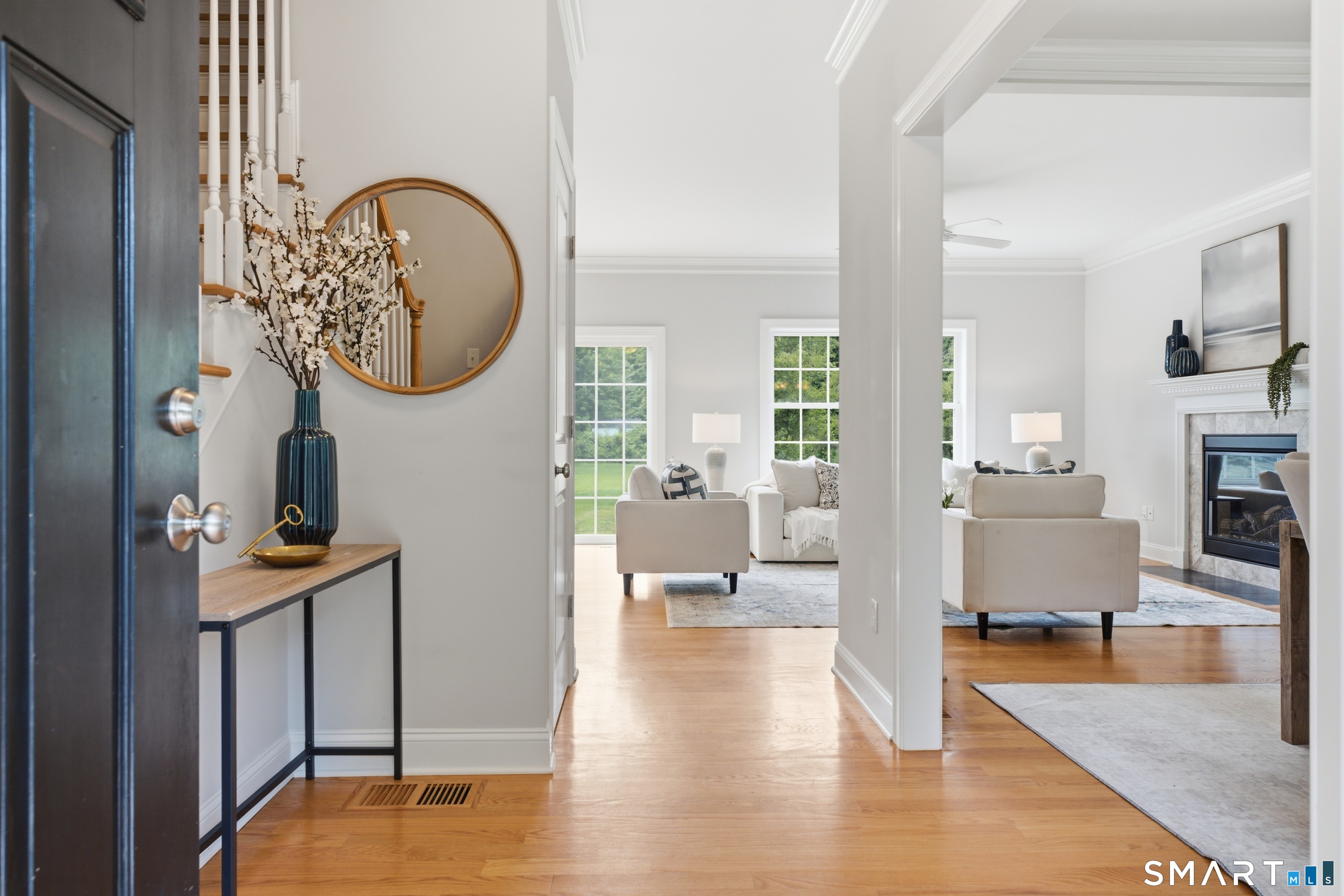 838 Little Meadow Road Guilford, CT 06437 - Photo 36 of 40 The entry immediately showcases the open floor plan, bright light entering through oversized windows and soothing paint palette that is used throughout the house