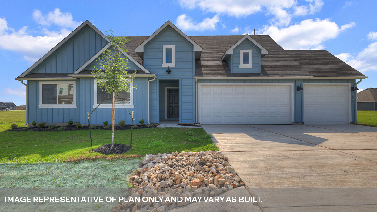 491 Atticus Cove Lockhart, TX 78644 - Photo 1 of 1 a front view of a house with a yard
