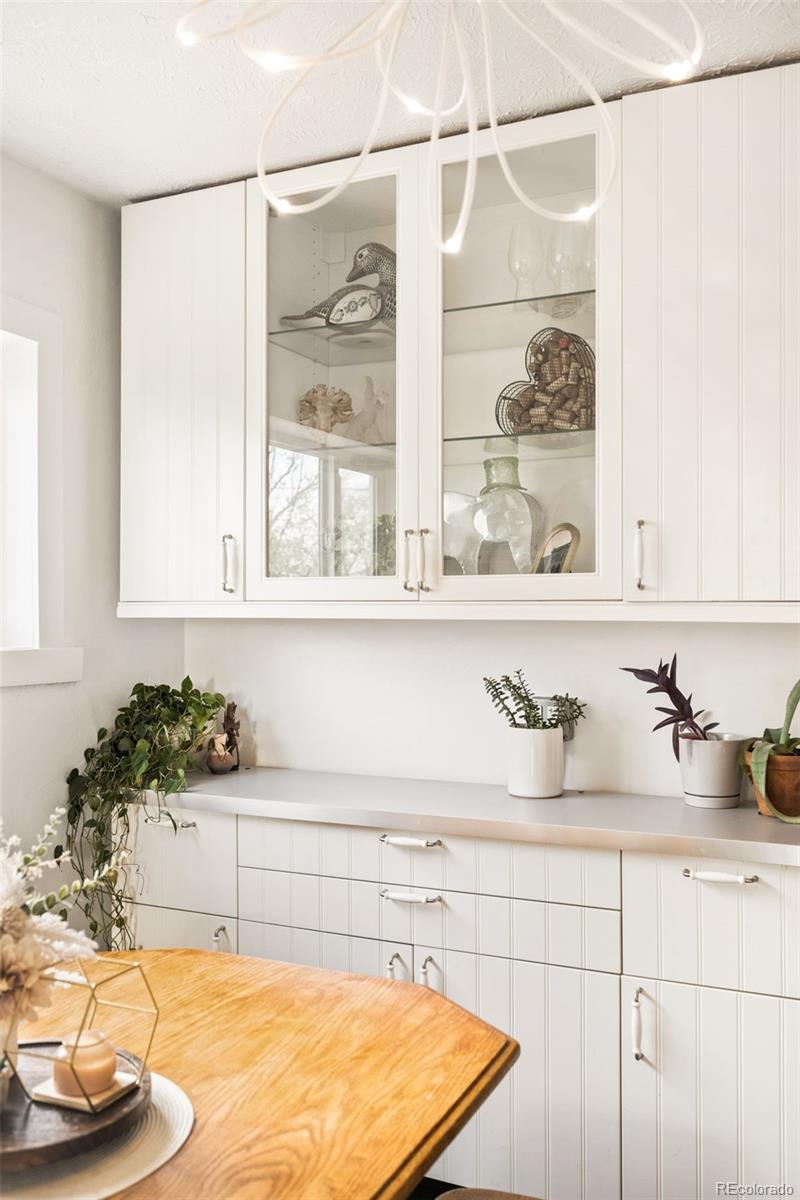 6800 Monaco Street Commerce City, CO 80022 - Photo 7 of 29 a bathroom with a tub and a shower