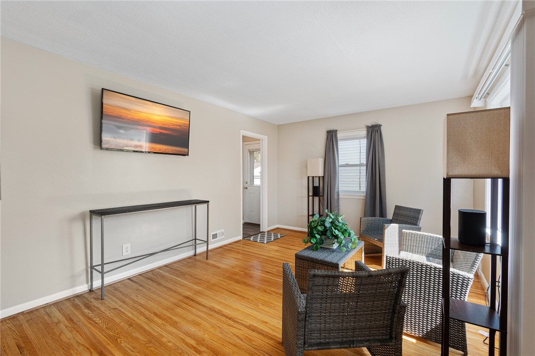 20 Studley Street Rochester, NY 14616 - Photo 8 of 35 Great living room! Beautifully kept hardwood floor