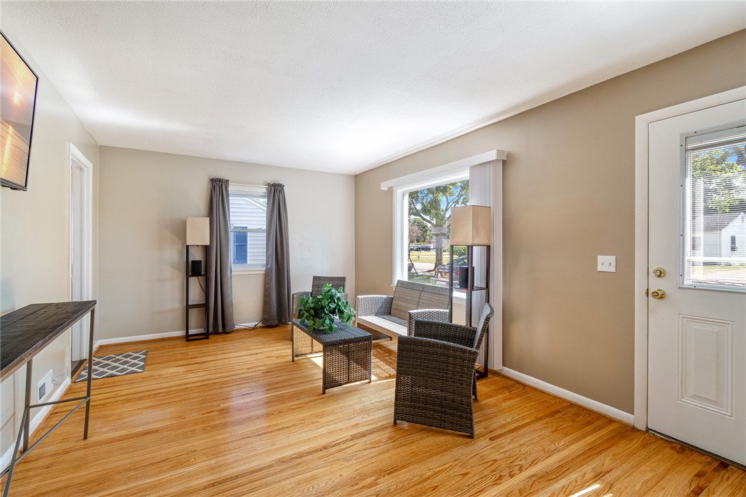 20 Studley Street Rochester, NY 14616 - Photo 9 of 35 The living room- updated windows! Beautiful HARDWO