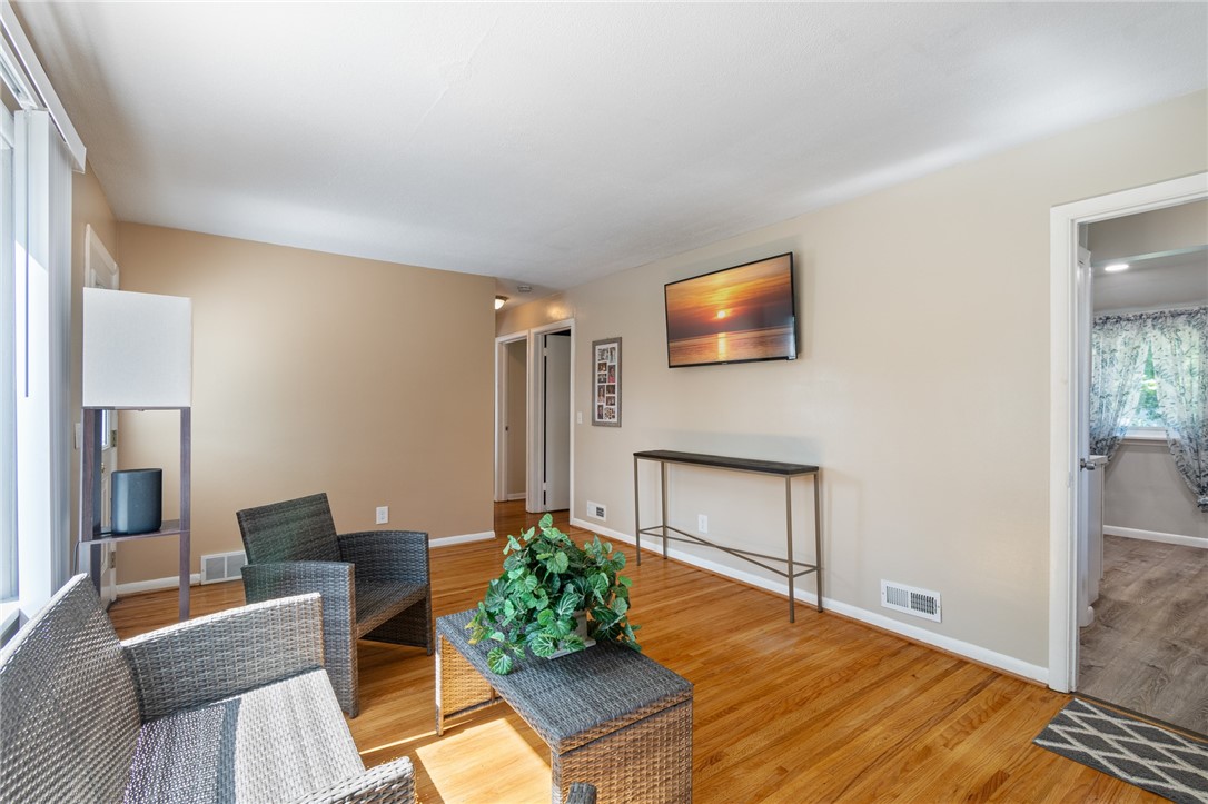 20 Studley Street Rochester, NY 14616 - Photo 10 of 35 Living room to the kitchen view