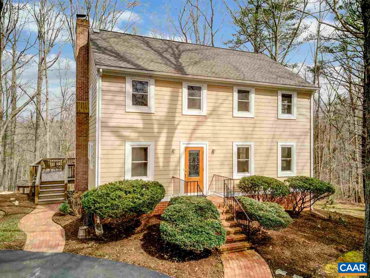 2295 Whippoorwill Road Charlottesville, VA 22901 - Photo 1 of 49 a front view of a house with garden