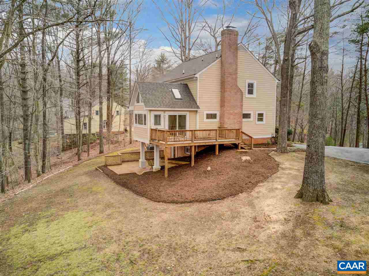 2295 Whippoorwill Road Charlottesville, VA 22901 - Photo 43 of 49 a front view of a house with a yard