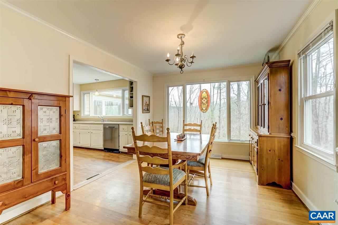 2295 Whippoorwill Road Charlottesville, VA 22901 - Photo 7 of 49 a view of a livingroom with furniture window and wooden floor