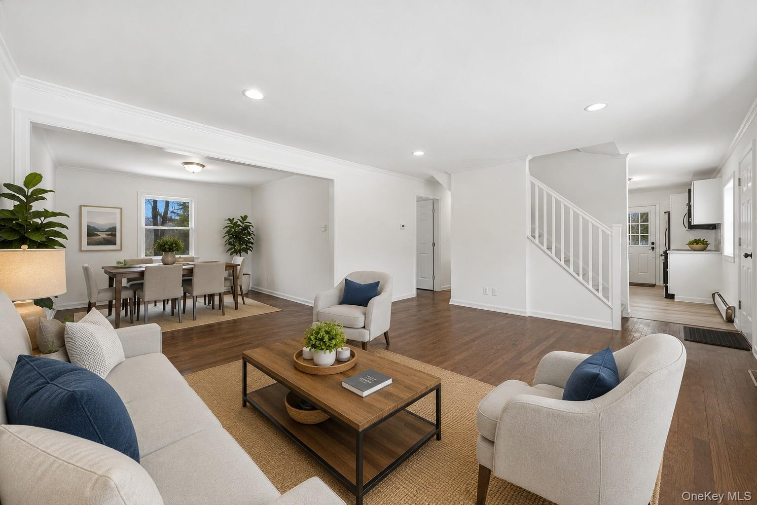 785 Locksley Road Yorktown Heights, NY 10598 - Photo 5 of 16 Open-concept living area with wood-finish flooring, recessed lighting, and white trim photos have been digitally enhanced to illustrate the property's potential.