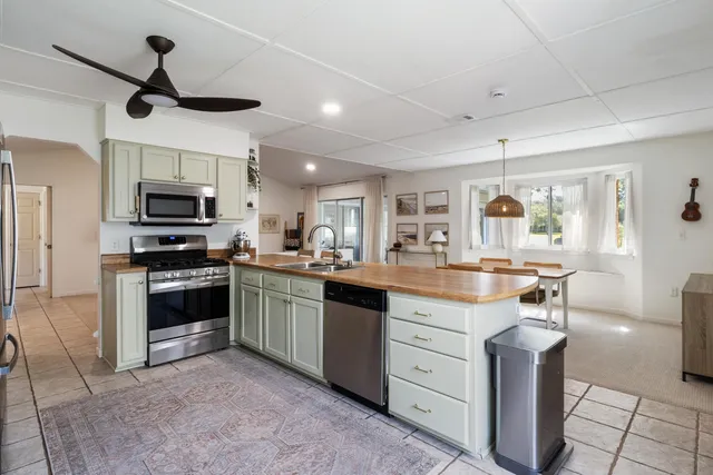 a dining room with a table and chairs