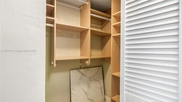 a view of storage and utility room