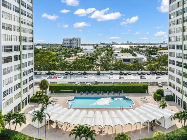 a view of a city with tall buildings