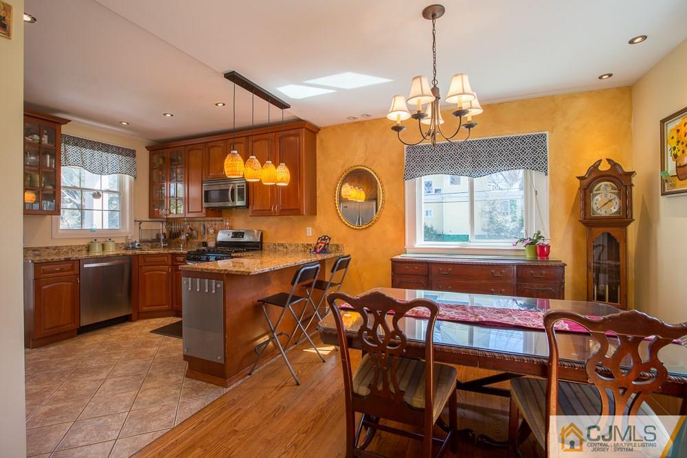 60 Rector Street Metuchen, NJ 08840 - Photo 6 of 25 a view of a dining room with furniture window and wooden floor
