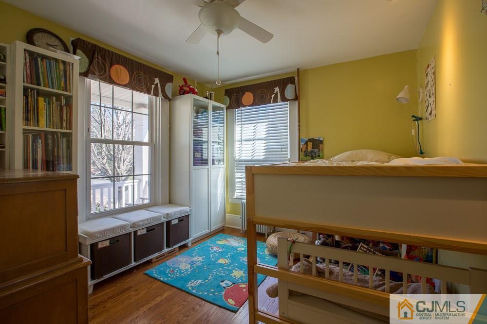 60 Rector Street Metuchen, NJ 08840 - Photo 7 of 25 a view of room with window and wooden floor