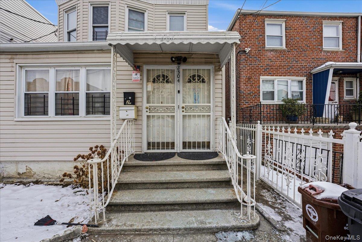 2304 Glebe Avenue Bronx, NY 10462 - Photo 2 of 36 a view of a house with wooden fence
