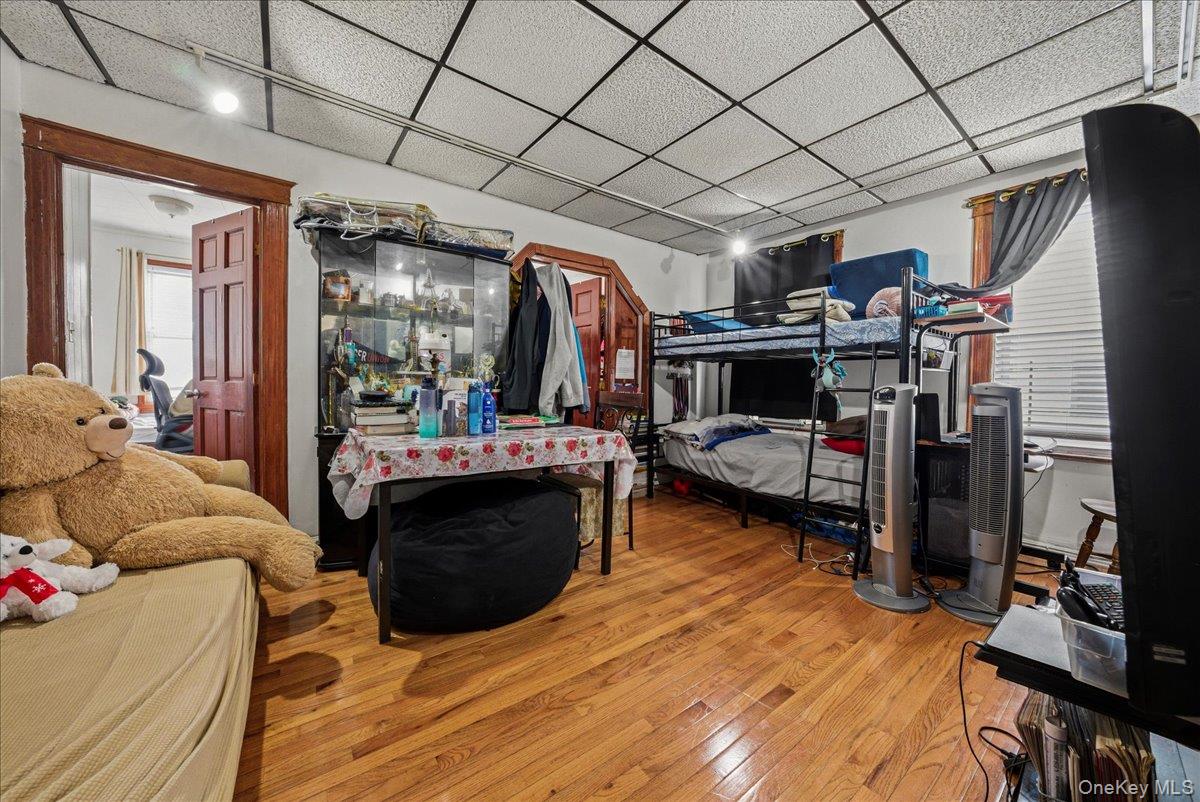 2304 Glebe Avenue Bronx, NY 10462 - Photo 22 of 36 a view of a livingroom with furniture and a garage