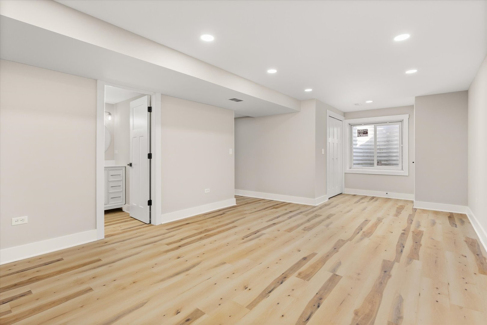 110 Kevin Drive Diamond, IL 60416 - Photo 14 of 39 a view of empty room with wooden floor and fan