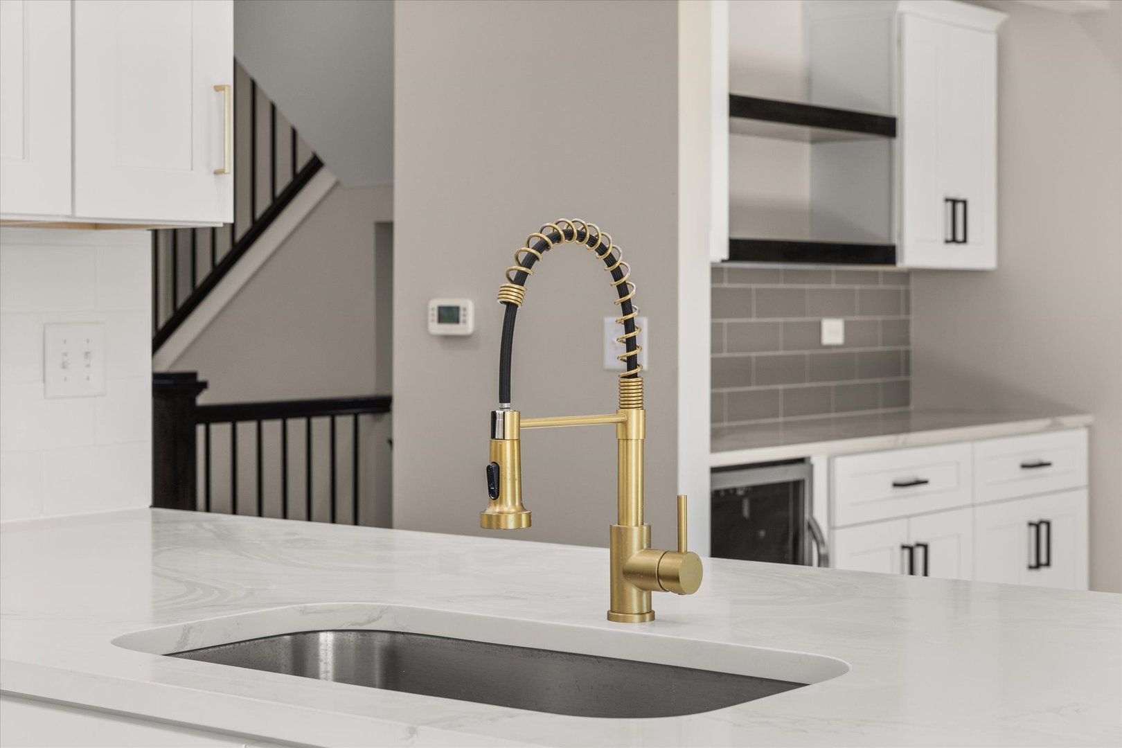 110 Kevin Drive Diamond, IL 60416 - Photo 6 of 39 a view of kitchen with sink and mirror
