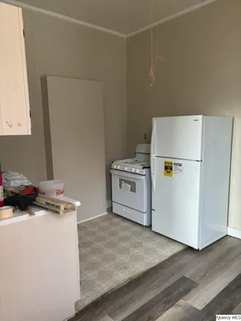 a utility room with washer and dryer