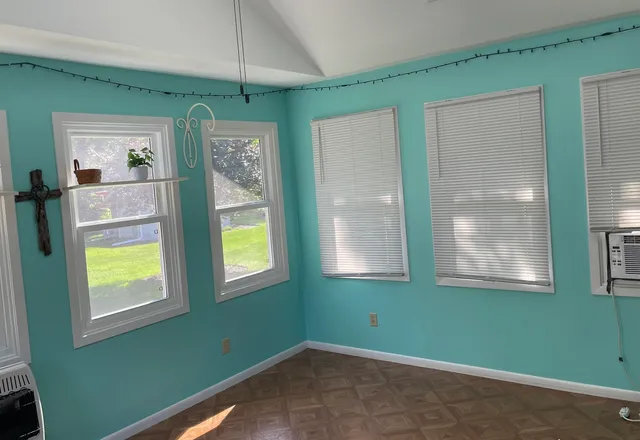 a view of a back yard of the house