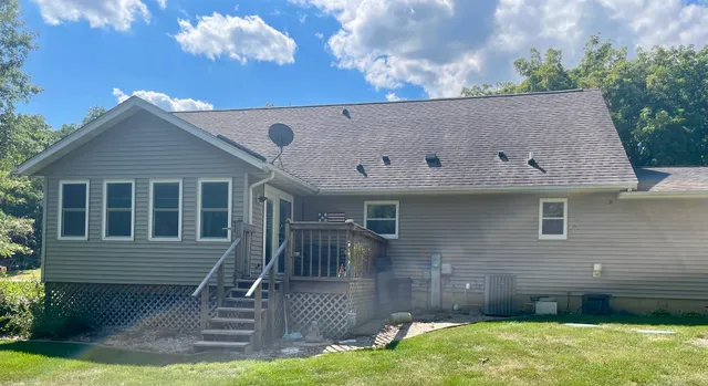 a bathroom with a toilet a sink and bathtub