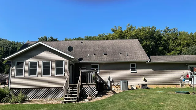 a house view with a garden space