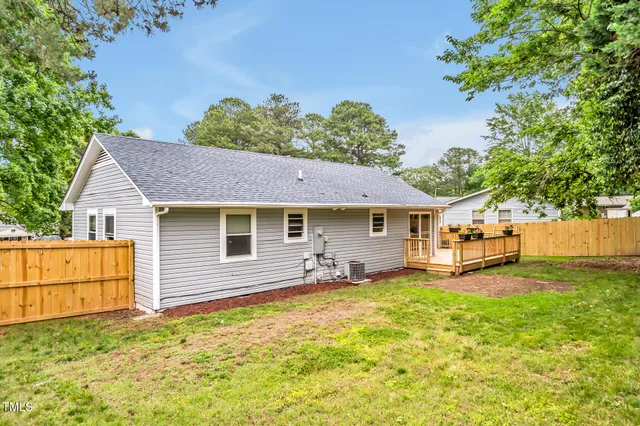 a house view with a garden space
