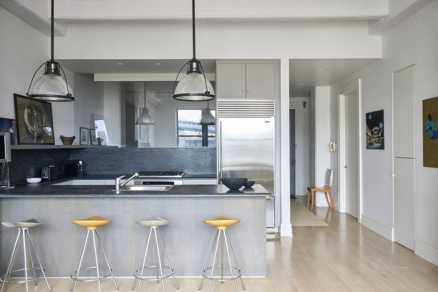 30 Main Street, Unit 7H Brooklyn, NY 11201 - Photo 2 of 10 a kitchen with a sink refrigerator and cabinets