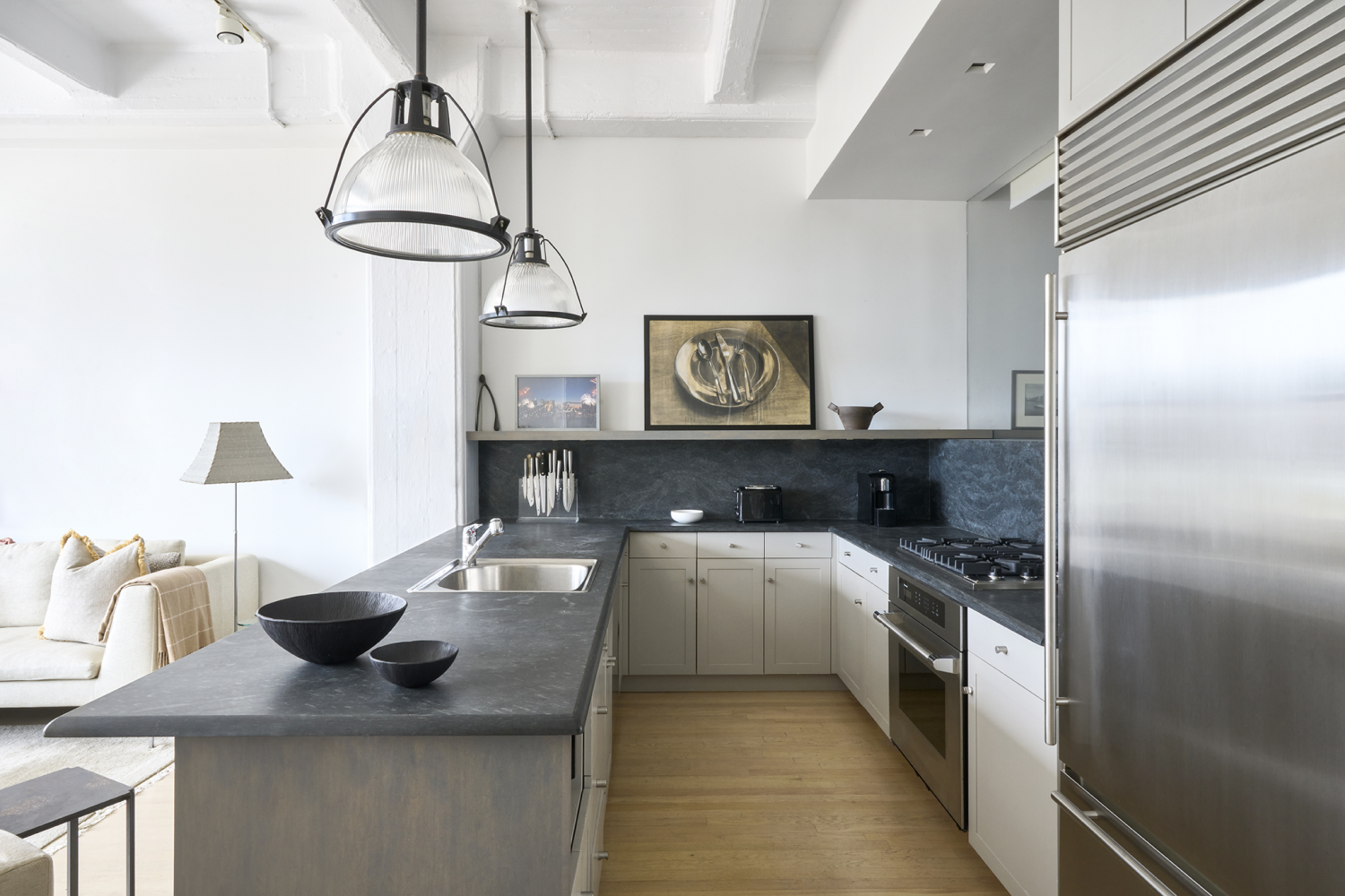 30 Main Street, Unit 7H Brooklyn, NY 11201 - Photo 3 of 10 a kitchen with cabinets a sink and appliances