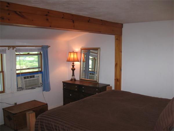 10 Cedar Road Groton, MA 01450 - Photo 15 of 27 a bedroom with a bed and window