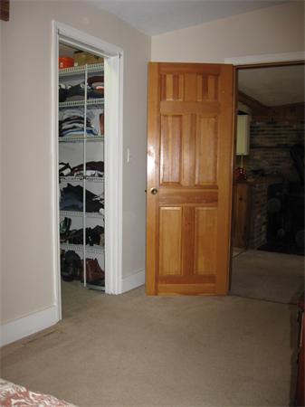 10 Cedar Road Groton, MA 01450 - Photo 17 of 27 a view of an empty room with kitchen and a window